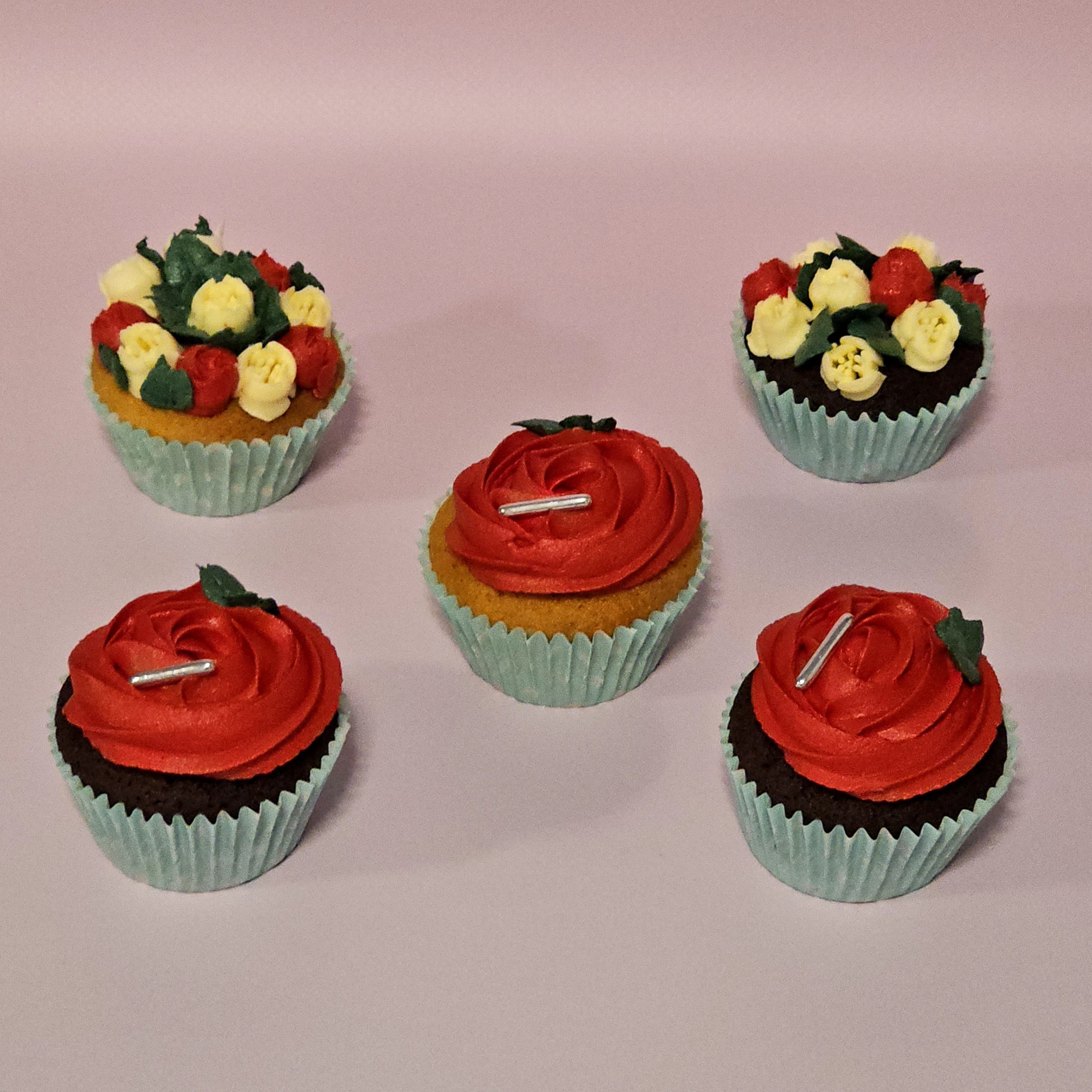 Five floral design cupcakes